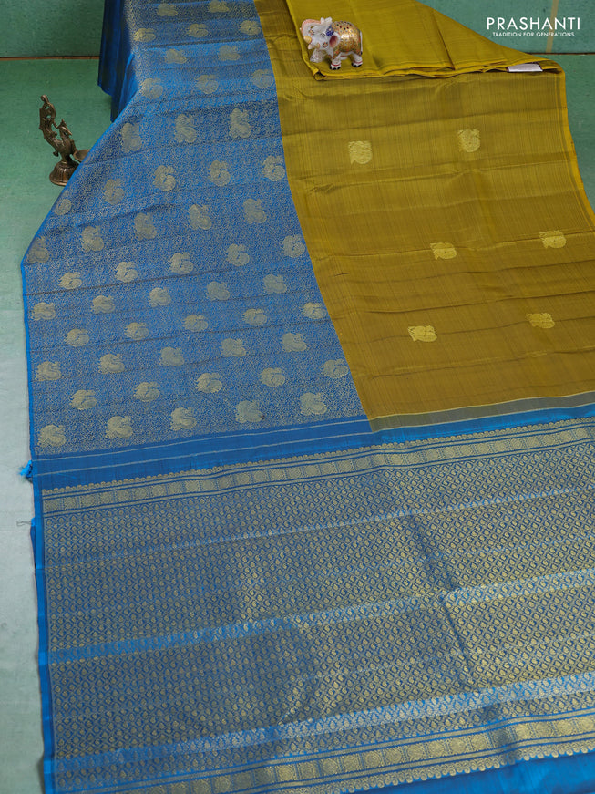 Pure kanchipuram silk saree mehendi green and cs blue with half & half style and long zari woven border