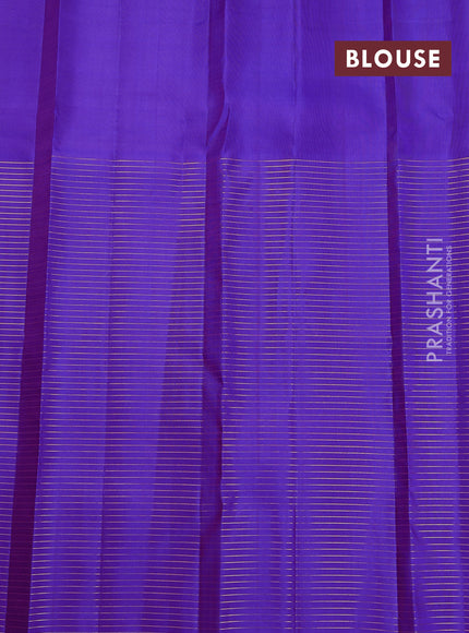 Pure kanchipuram silk saree dual shade of pinkish orange and purple with half & half style and long zari woven border