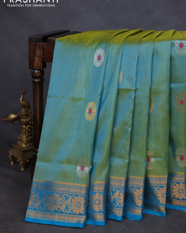 Pure uppada silk saree dual shade of green and teal blue with silver & gold zari woven buttas and zari woven border