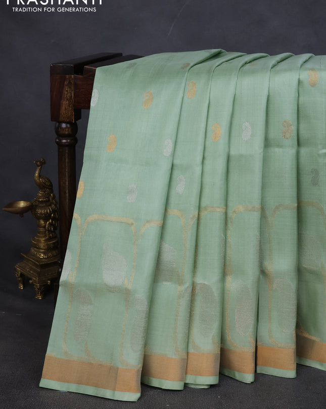 Pure uppada silk saree pista green with silver & gold paisley buttas and zari woven border