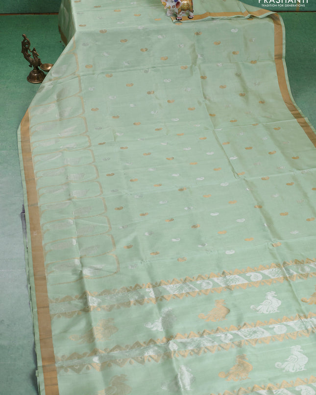 Pure uppada silk saree pista green with silver & gold paisley buttas and zari woven border