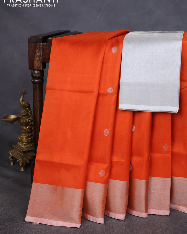 Pure uppada silk saree orange with silver zari woven buttas and silver zari woven border