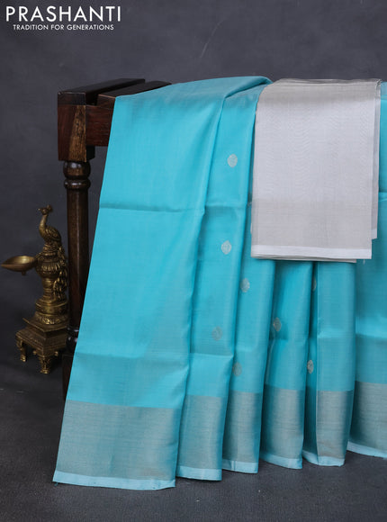 Pure uppada silk saree teal blue with silver zari woven buttas and silver zari woven border