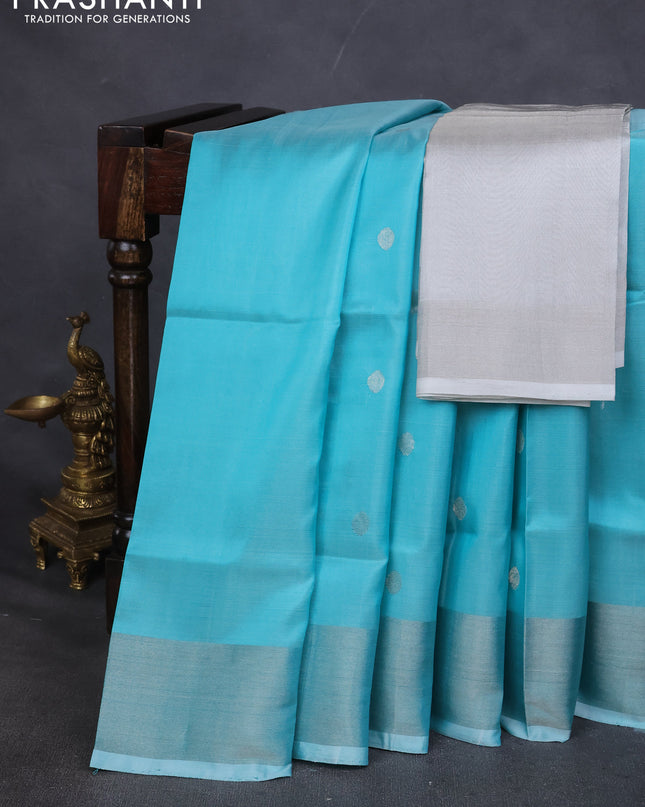 Pure uppada silk saree teal blue with silver zari woven buttas and silver zari woven border