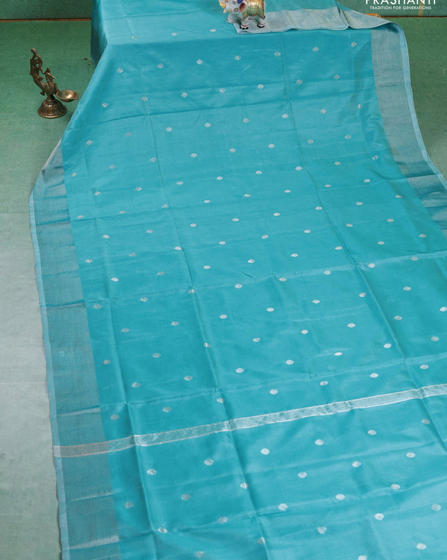 Pure uppada silk saree teal blue with silver zari woven buttas and silver zari woven border