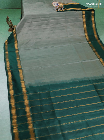 Pure uppada silk saree dual shade of green and green with plain body and rettapet zari woven border
