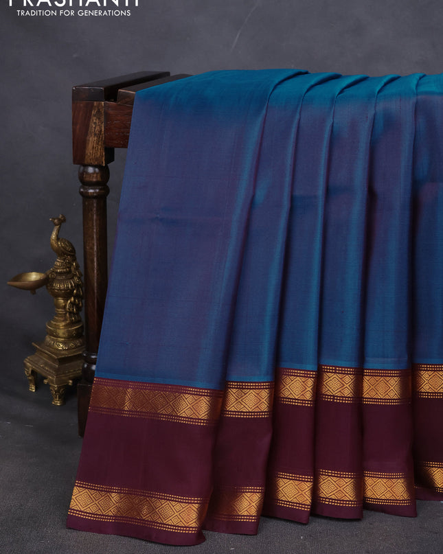 Pure uppada silk saree cs blue and wine shade with plain body and rettapet zari woven border