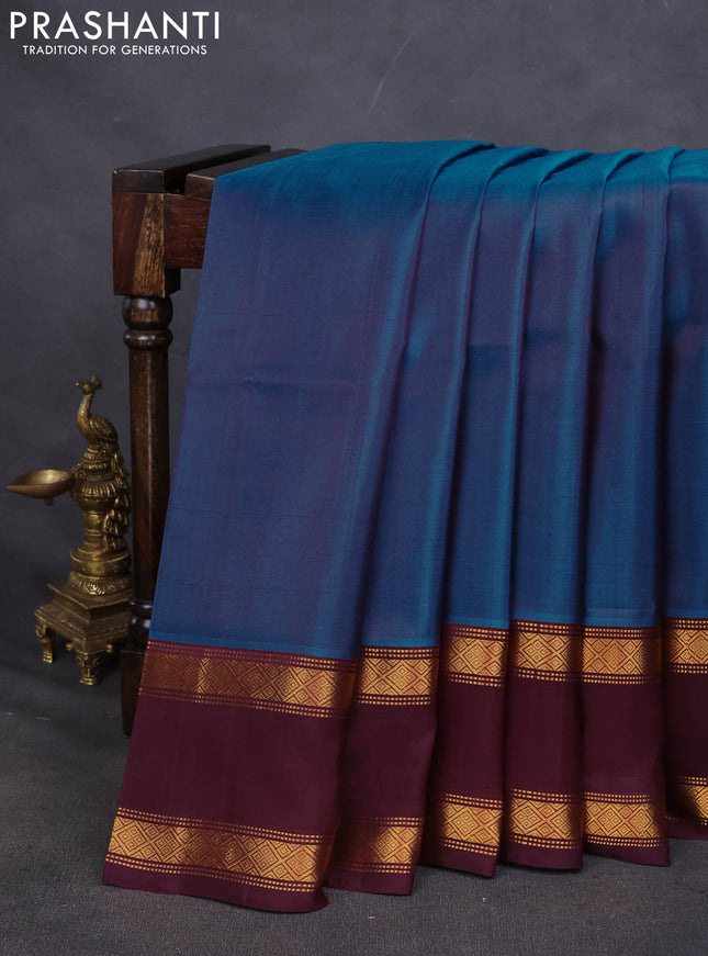 Pure uppada silk saree cs blue and wine shade with plain body and rettapet zari woven border