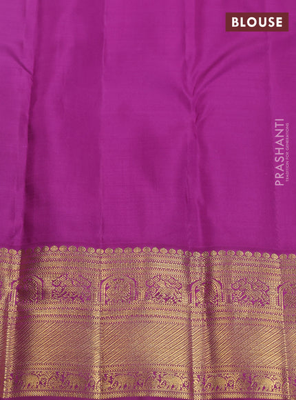 Pure kanchipuram silk saree teal blue and purple with allover zari woven brocade weaves and zari woven korvai border