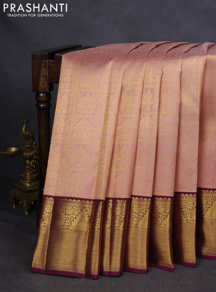 Pure kanchipuram silk saree peach shade and wine shade with allover zari woven brocade weaves and zari woven korvai border