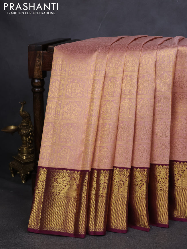 Pure kanchipuram silk saree peach shade and wine shade with allover zari woven brocade weaves and zari woven korvai border