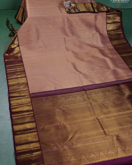 Pure kanchipuram silk saree peach shade and wine shade with allover zari woven brocade weaves and zari woven korvai border