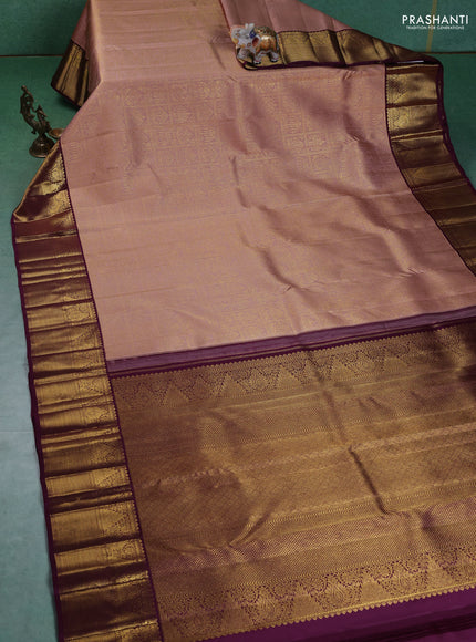 Pure kanchipuram silk saree peach shade and wine shade with allover zari woven brocade weaves and zari woven korvai border