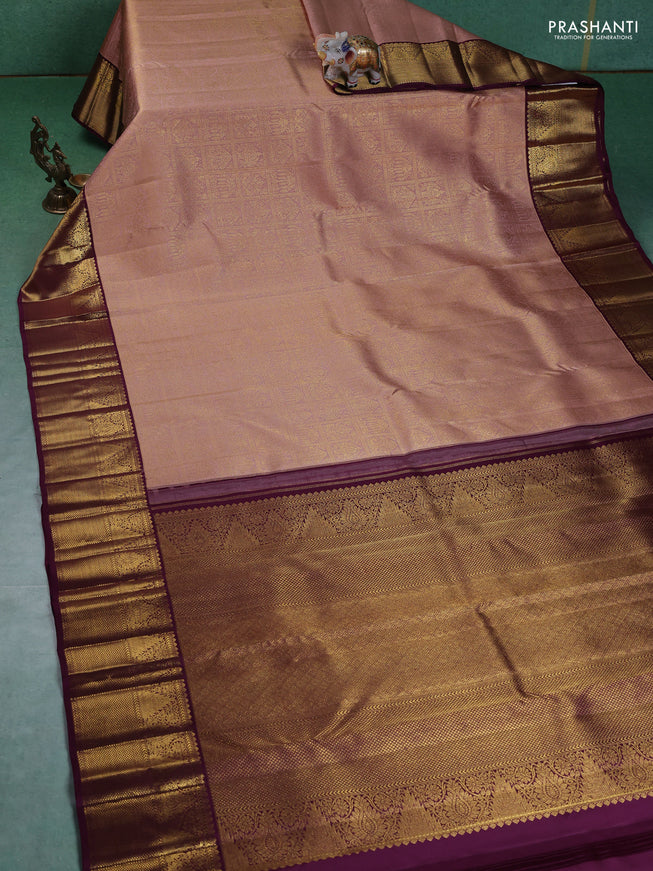 Pure kanchipuram silk saree peach shade and wine shade with allover zari woven brocade weaves and zari woven korvai border
