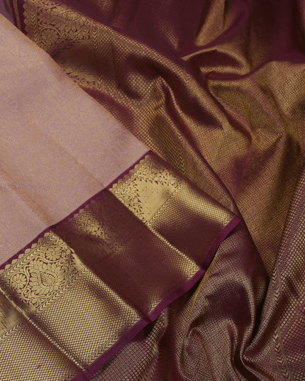 Pure kanchipuram silk saree peach shade and wine shade with allover zari woven brocade weaves and zari woven korvai border