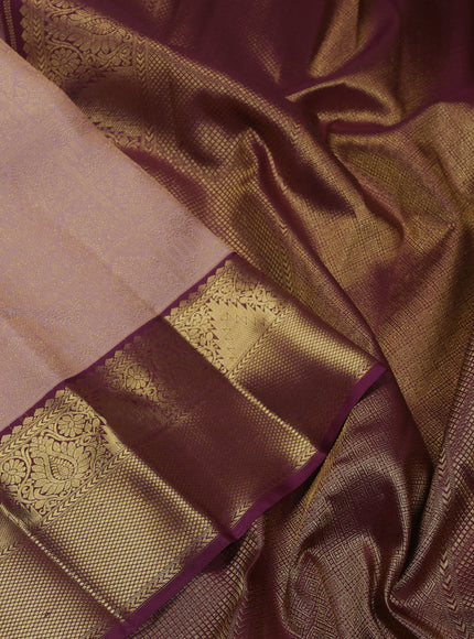 Pure kanchipuram silk saree peach shade and wine shade with allover zari woven brocade weaves and zari woven korvai border