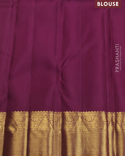 Pure kanchipuram silk saree peach shade and wine shade with allover zari woven brocade weaves and zari woven korvai border