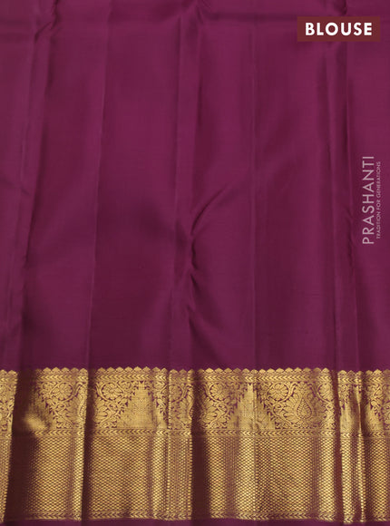 Pure kanchipuram silk saree peach shade and wine shade with allover zari woven brocade weaves and zari woven korvai border