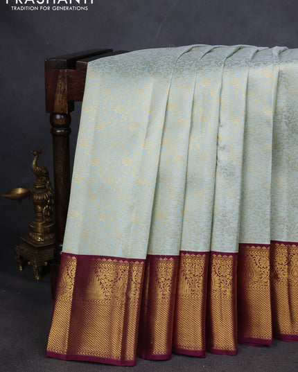 Pure kanchipuram silk saree pastel green and wine shade with allover zari woven brocade weaves and zari woven korvai border