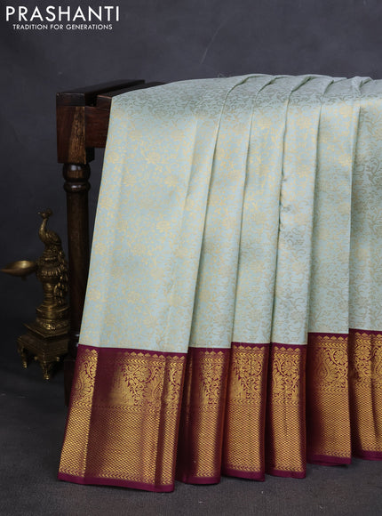 Pure kanchipuram silk saree pastel green and wine shade with allover zari woven brocade weaves and zari woven korvai border