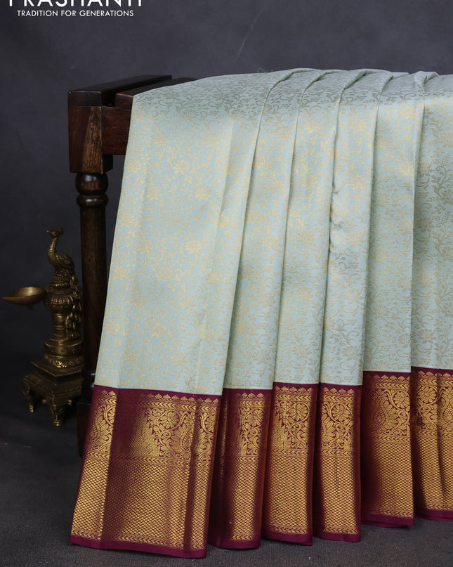 Pure kanchipuram silk saree pastel green and wine shade with allover zari woven brocade weaves and zari woven korvai border