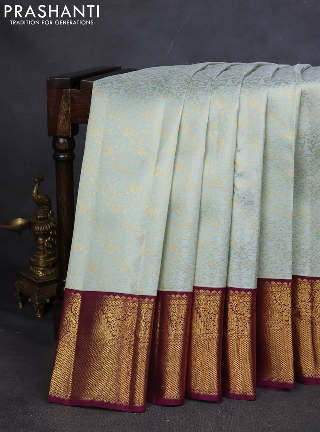 Pure kanchipuram silk saree pastel green and wine shade with allover zari woven brocade weaves and zari woven korvai border