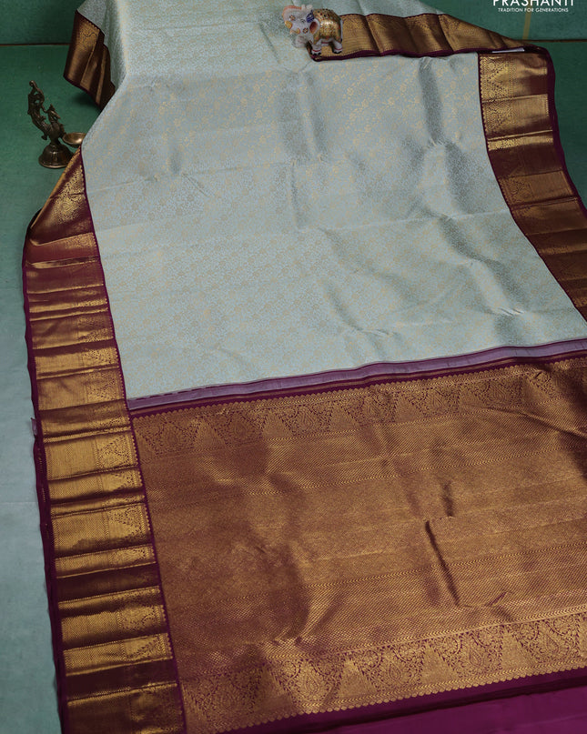 Pure kanchipuram silk saree pastel green and wine shade with allover zari woven brocade weaves and zari woven korvai border