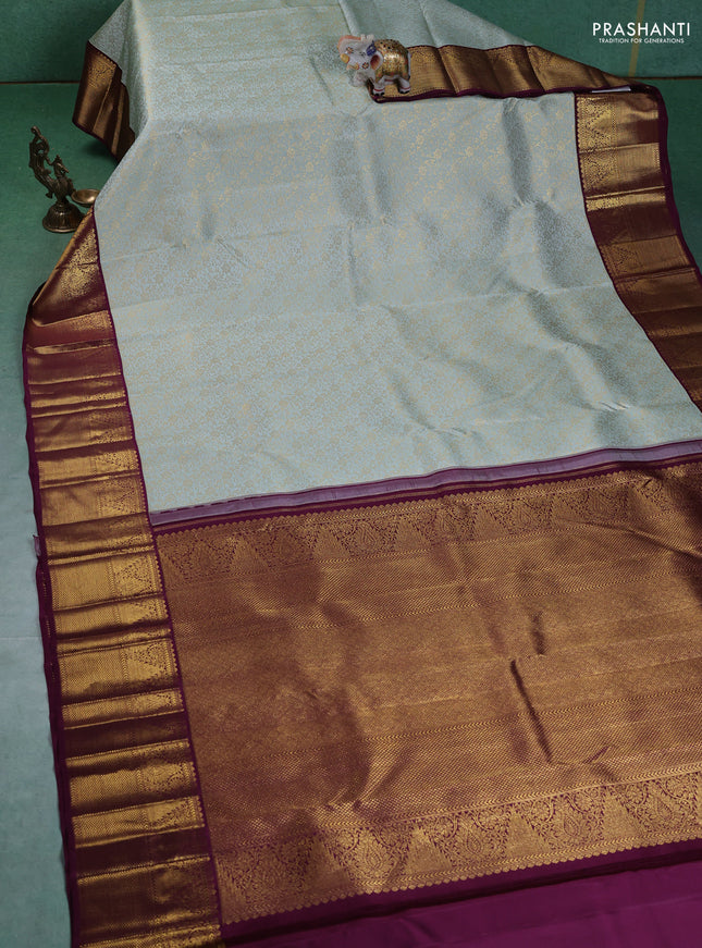 Pure kanchipuram silk saree pastel green and wine shade with allover zari woven brocade weaves and zari woven korvai border