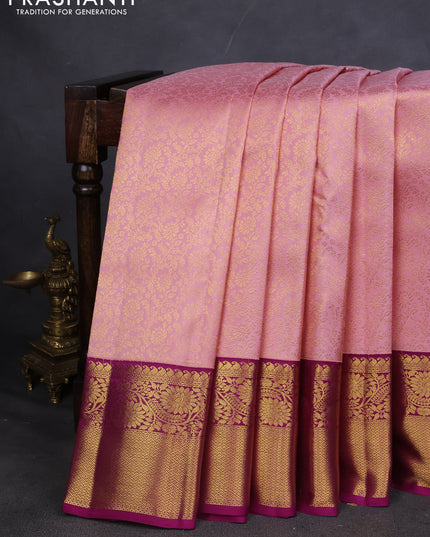 Pure kanchipuram silk saree light pink and purple with allover zari woven brocade weaves and zari woven korvai border