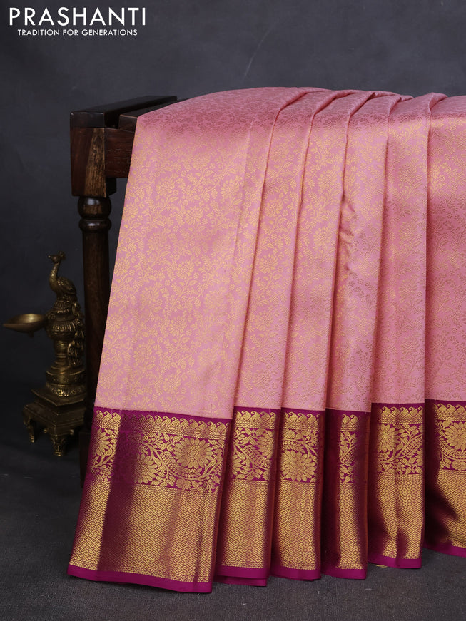 Pure kanchipuram silk saree light pink and purple with allover zari woven brocade weaves and zari woven korvai border
