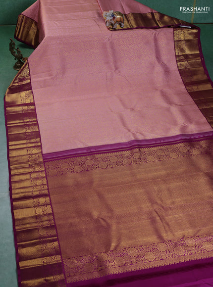 Pure kanchipuram silk saree light pink and purple with allover zari woven brocade weaves and zari woven korvai border