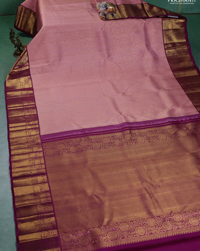 Pure kanchipuram silk saree light pink and purple with allover zari woven brocade weaves and zari woven korvai border