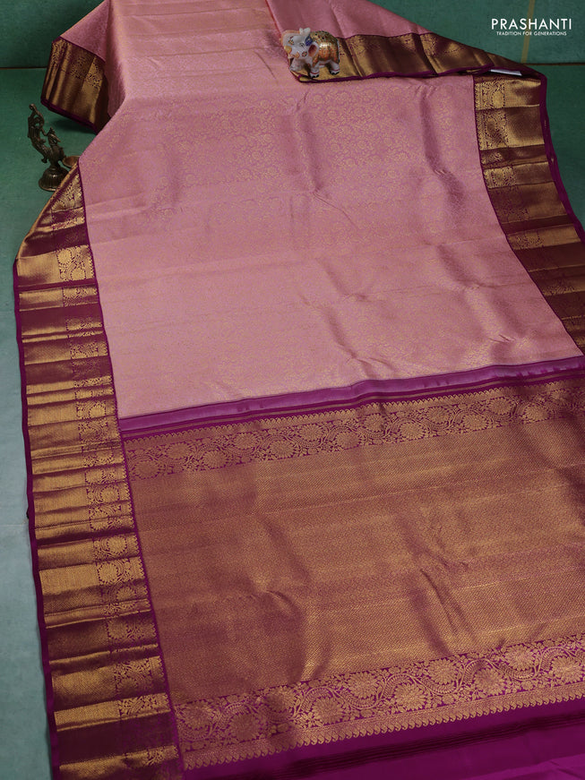 Pure kanchipuram silk saree light pink and purple with allover zari woven brocade weaves and zari woven korvai border