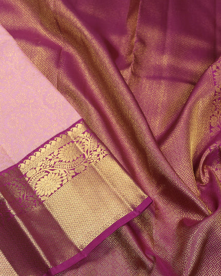 Pure kanchipuram silk saree light pink and purple with allover zari woven brocade weaves and zari woven korvai border