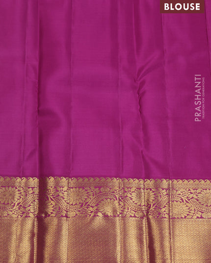 Pure kanchipuram silk saree light pink and purple with allover zari woven brocade weaves and zari woven korvai border