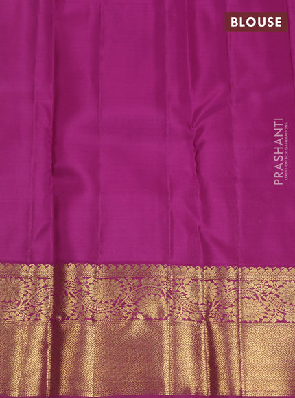Pure kanchipuram silk saree light pink and purple with allover zari woven brocade weaves and zari woven korvai border