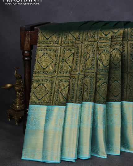 Pure kanchipuram silk saree green and teal blue with allover zari woven brocade weaves and zari woven korvai border
