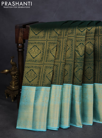 Pure kanchipuram silk saree green and teal blue with allover zari woven brocade weaves and zari woven korvai border