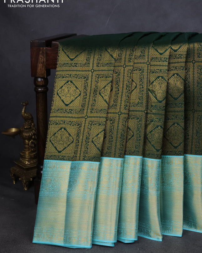 Pure kanchipuram silk saree green and teal blue with allover zari woven brocade weaves and zari woven korvai border