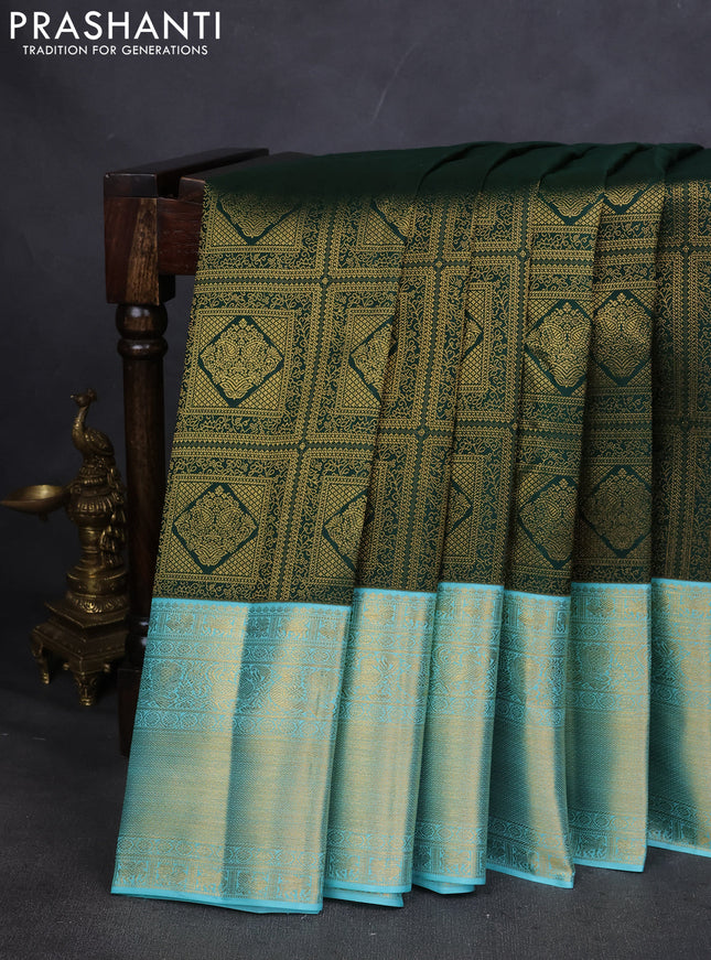 Pure kanchipuram silk saree green and teal blue with allover zari woven brocade weaves and zari woven korvai border