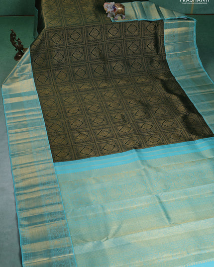 Pure kanchipuram silk saree green and teal blue with allover zari woven brocade weaves and zari woven korvai border