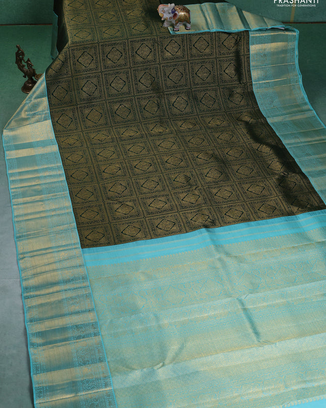 Pure kanchipuram silk saree green and teal blue with allover zari woven brocade weaves and zari woven korvai border