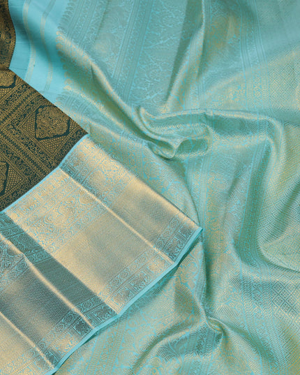 Pure kanchipuram silk saree green and teal blue with allover zari woven brocade weaves and zari woven korvai border