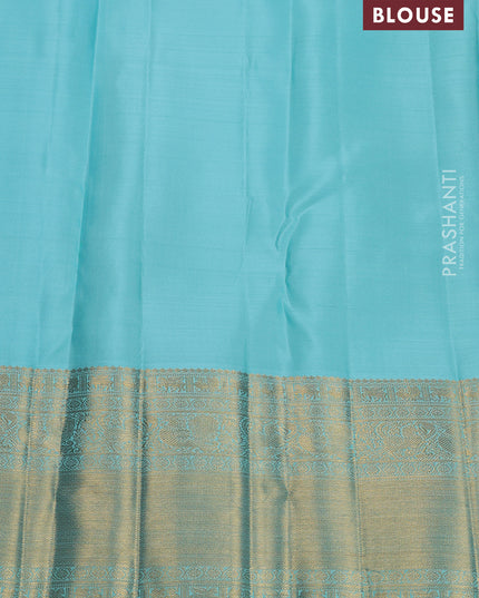 Pure kanchipuram silk saree green and teal blue with allover zari woven brocade weaves and zari woven korvai border