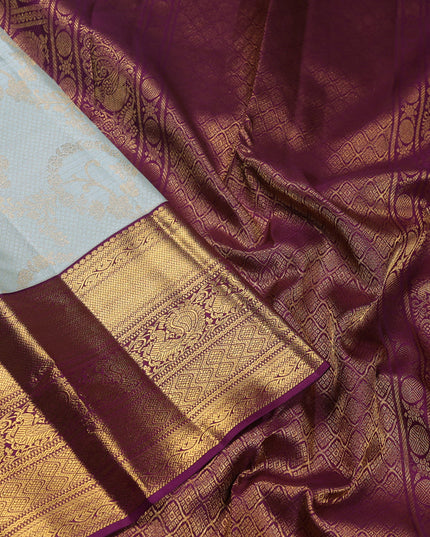 Pure kanchipuram silk saree pastel blue and purple with allover zari woven brocade weaves and zari woven korvai border