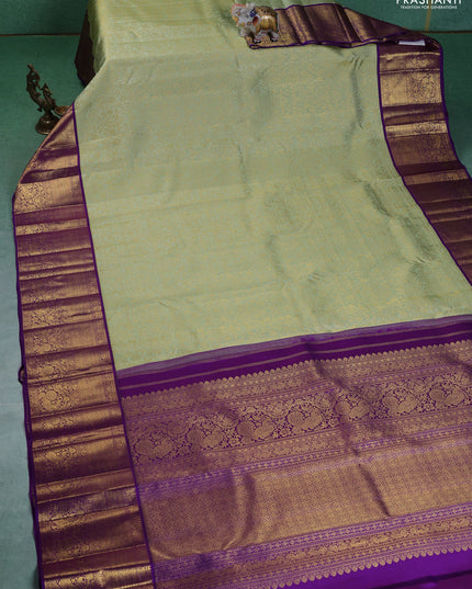 Pure kanchipuram silk saree pista green and violet with allover zari woven brocade weaves and zari woven korvai border