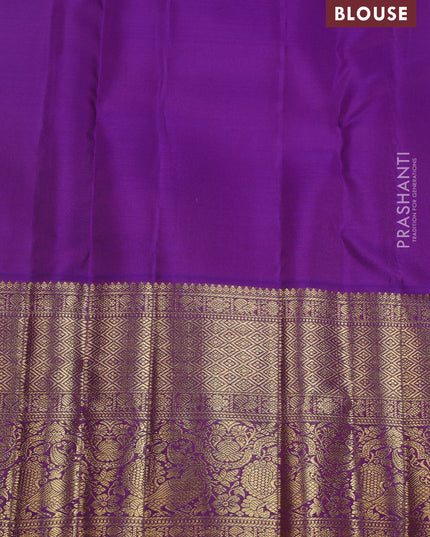 Pure kanchipuram silk saree pista green and violet with allover zari woven brocade weaves and zari woven korvai border