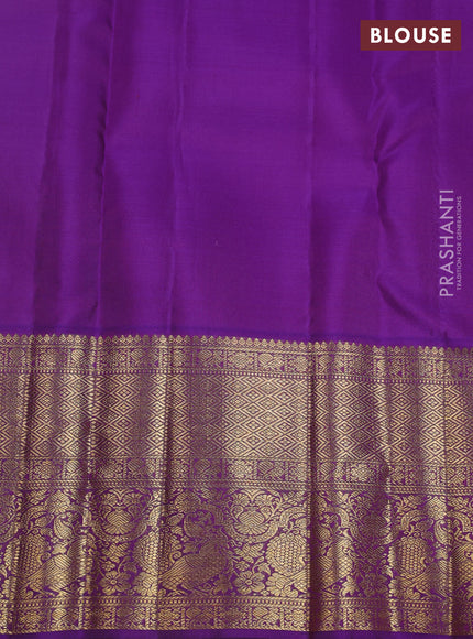 Pure kanchipuram silk saree pista green and violet with allover zari woven brocade weaves and zari woven korvai border