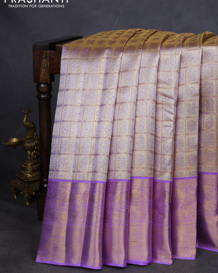 Pure kanchipuram silk saree gold and lavender with allover zari woven brocade weaves and zari woven korvai border