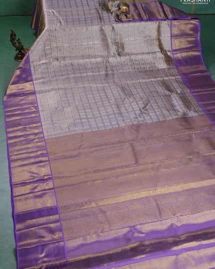 Pure kanchipuram silk saree gold and lavender with allover zari woven brocade weaves and zari woven korvai border